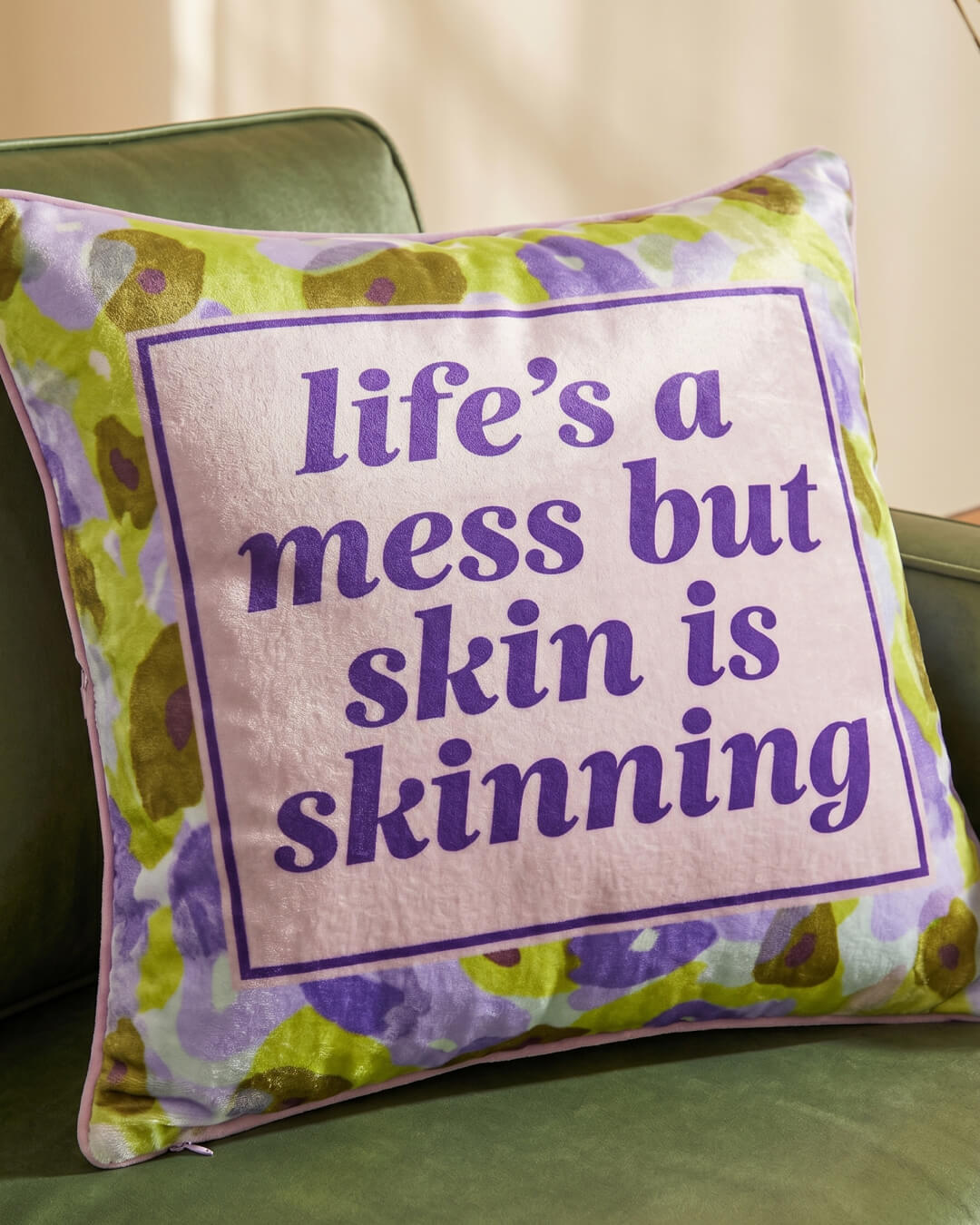 life's a mess but skin is skinning pillow